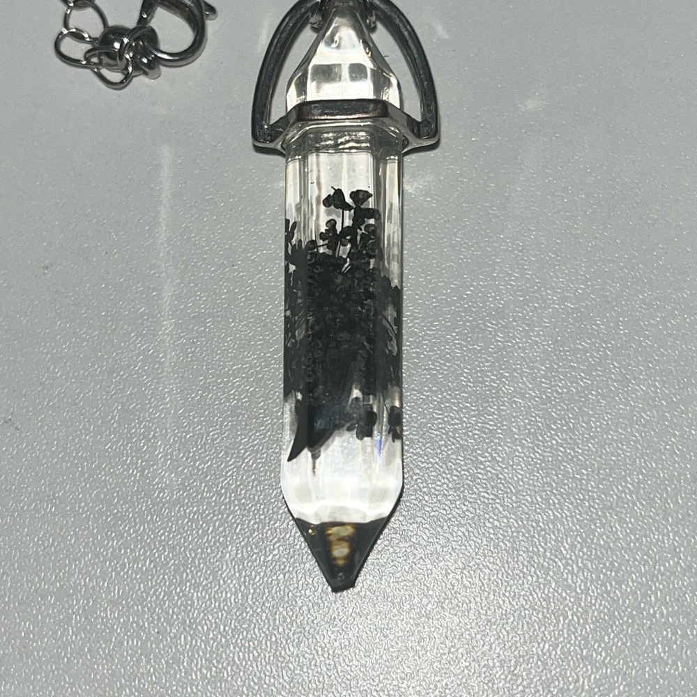 Medium size silver chain necklace with crescent moon in crystal.